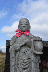 Close-up of statue against sky
