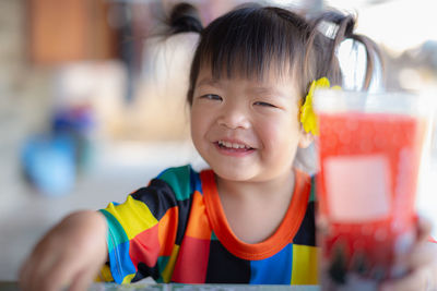 Portrait of cute boy smiling