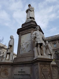 Low angle view of statue against sky