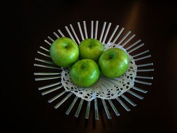 High angle view of apples in plate on table