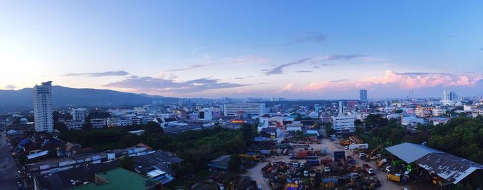 Aerial view of cityscape against sky