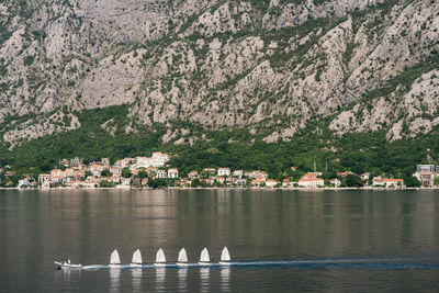 Scenic view of sea against mountains