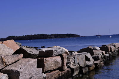 Scenic view of sea against clear sky