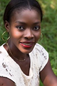 Close-up portrait of a smiling young woman