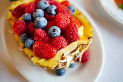 High angle view of strawberries in plate