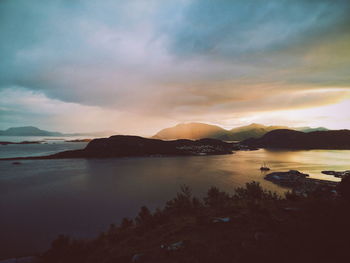 Scenic view of sea against dramatic sky