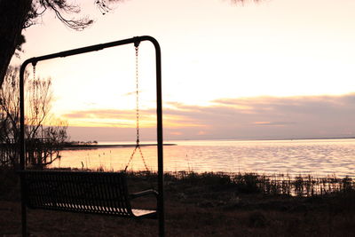 Scenic view of sea against sky at sunset