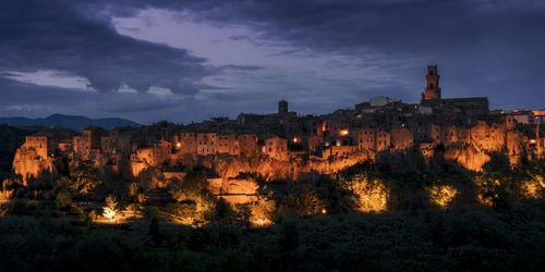 A tuscan hill town illuminated in blue hour