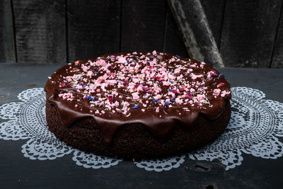 Close-up of cake served on table