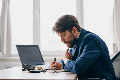 Man working on table