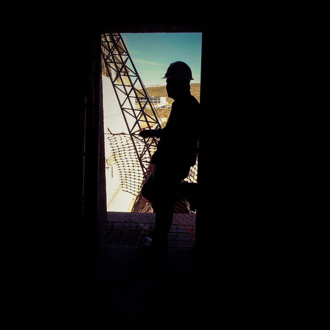 SILHOUETTE OF CHILDREN IN BUILDING