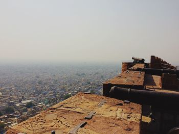 Buildings in city against sky