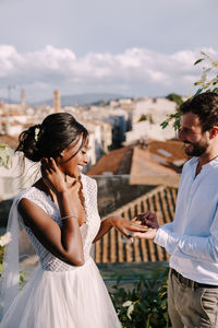 Young couple standing outdoors