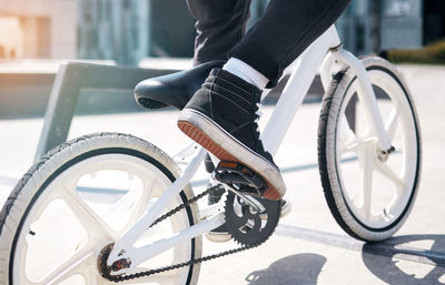 Low section of man riding bicycle