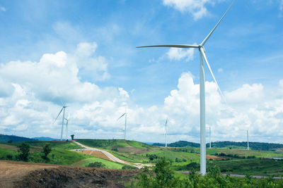 Wind turbines on field
