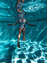 Woman swimming in pool