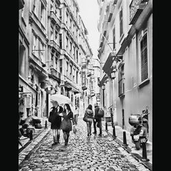 Man walking on street in city