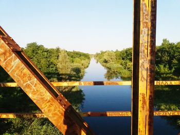 Close-up of river against clear blue sky