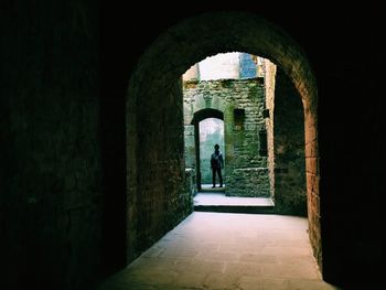 People walking in tunnel