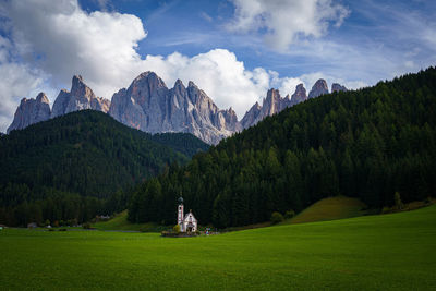 Scenic view of landscape and mountains against sky