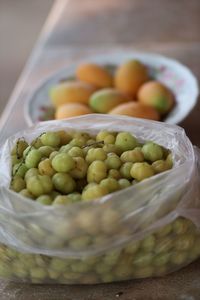 High angle view of fruits in container on table