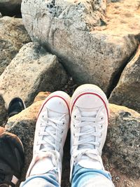 Low section of person on rock