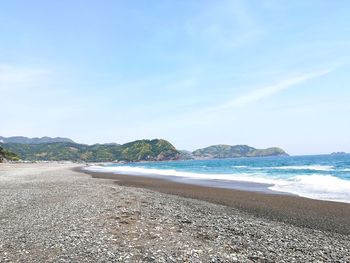Scenic view of beach against sky