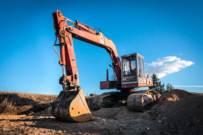 Low angle view of construction site against sky