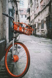 Bicycle parked by building