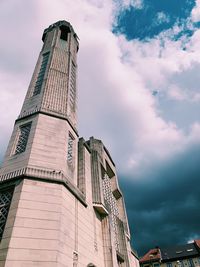 Low angle view of modern building against sky