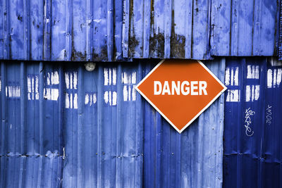 Danger sign on corrugated iron