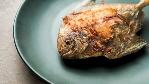 Close-up of food in plate on table