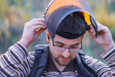 Young man wearing safety equipment