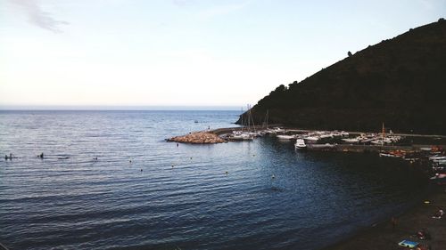 Distant marina against catalonia coastline