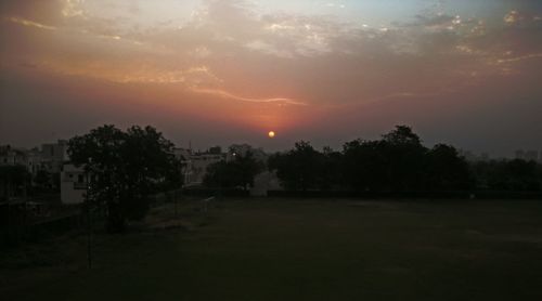 Scenic view of landscape at sunset