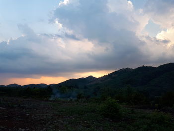 Scenic view of landscape against sky during sunset