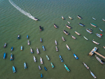 High angle view of boats moored on sea 