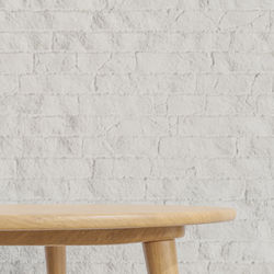 Close-up of chair on wall