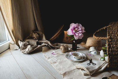 Flower vase on table at home