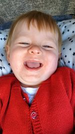 Close-up portrait of smiling cute baby girl