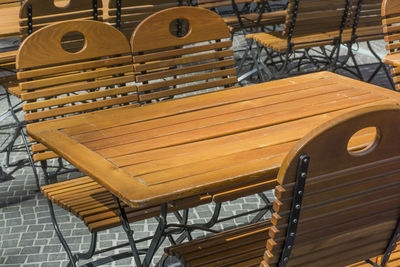 High angle view of empty chairs and table