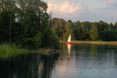 Scenic view of lake against sky during sunset