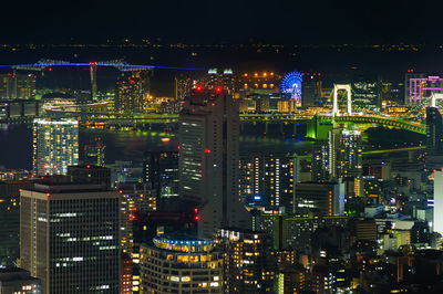 High angle view of illuminated buildings at night