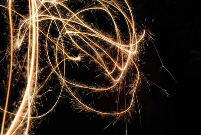 Close-up of firework display against black background