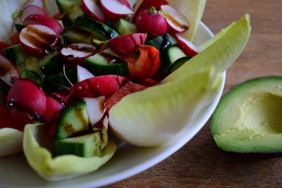 Close-up of chopped fruits on table