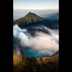 Panoramic view of volcanic landscape against sky