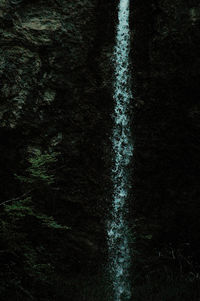 Close-up of water flowing at night