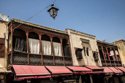 Low angle view of old building against clear sky