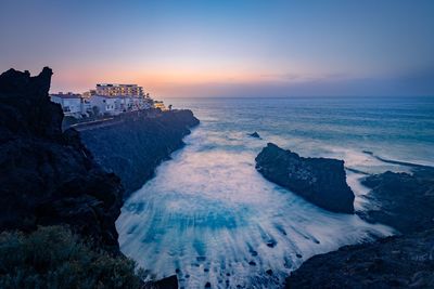 Scenic view of sea during sunset