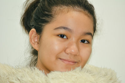 Close-up portrait of smiling woman